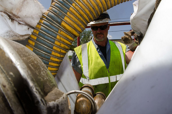 Worker repairs sewer lines
