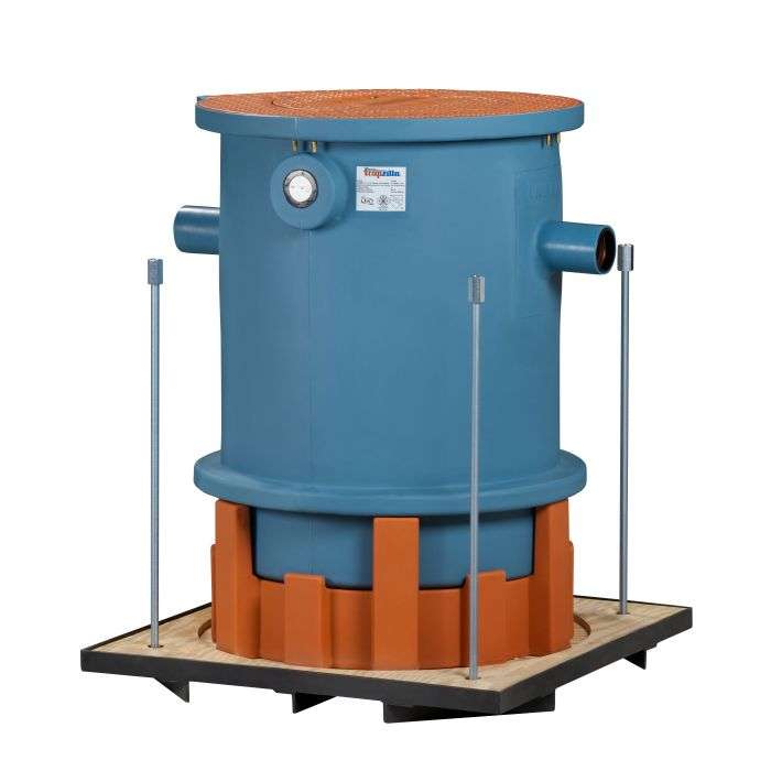 The HA-160 Hanging Assembly features a large blue tank with a round orange top, pressure gauge, multiple side pipe connections, and is mounted on a wooden pallet supported by metal rods at each corner.