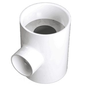 The 100 GPM Vented Flow Control Assembly features a white PVC sanitary tee with three openings, including a 90-degree side outlet, for plumbing connections to a grease interceptor. Shown on a plain light gray background.